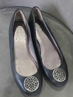Coach Black Leather Ballet Flats with Silver Logo Medallion